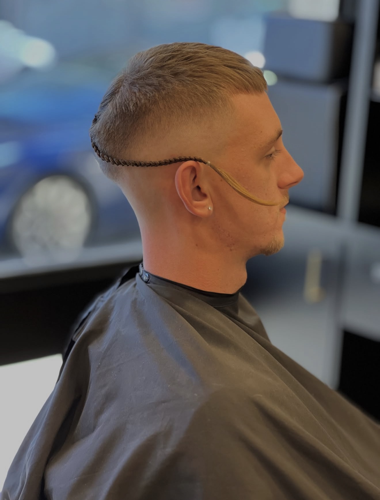 Short crop with a braided design line and high skin fade at Golden Fadz Gosford
